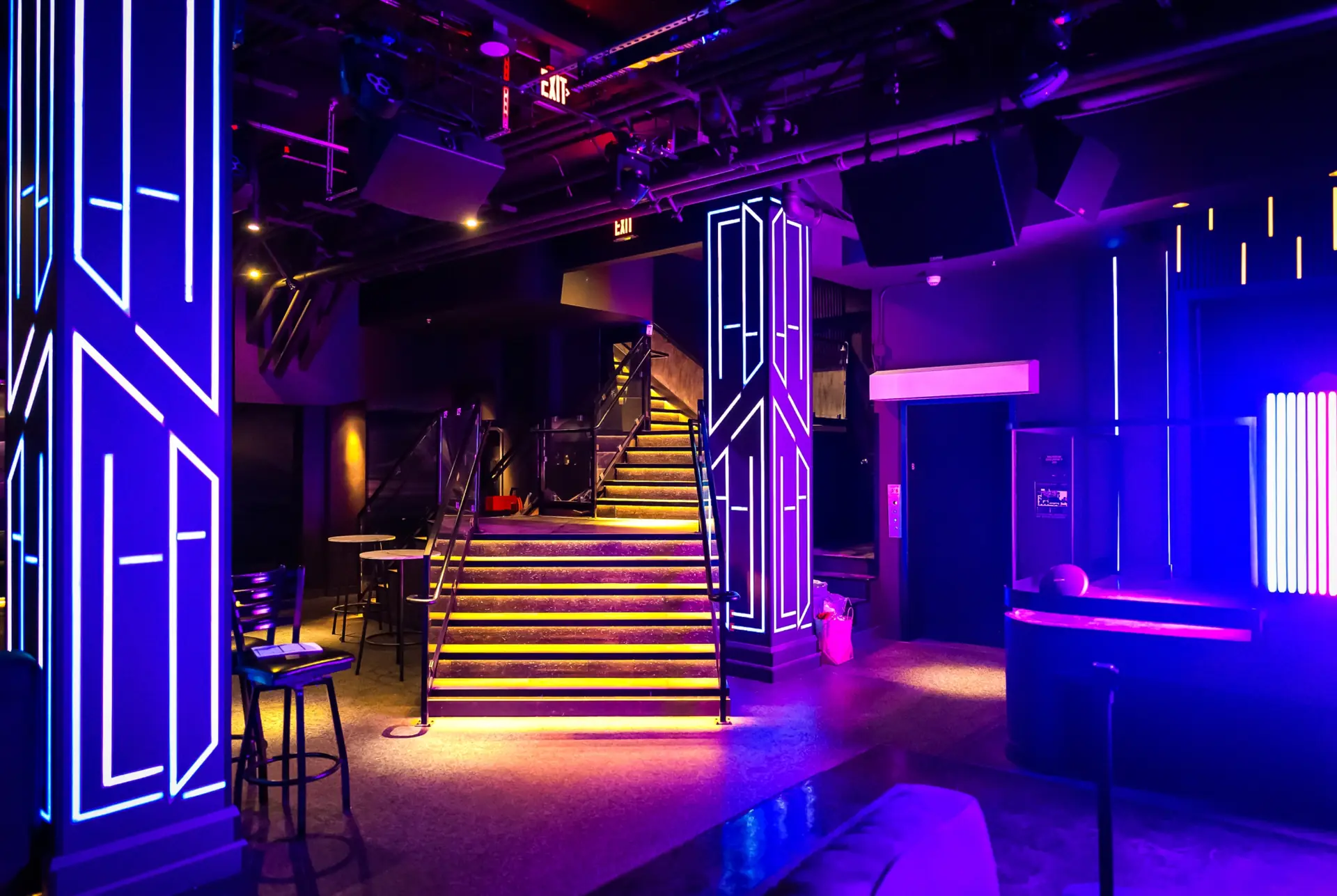The neon-lit main room at West 8 nightclub in downtown Los Angeles