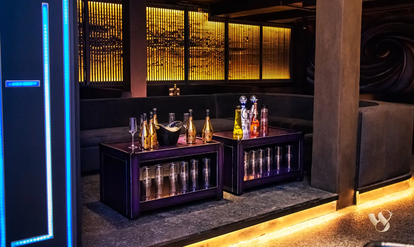 The W8 neon wordmark glowing inside West 8
